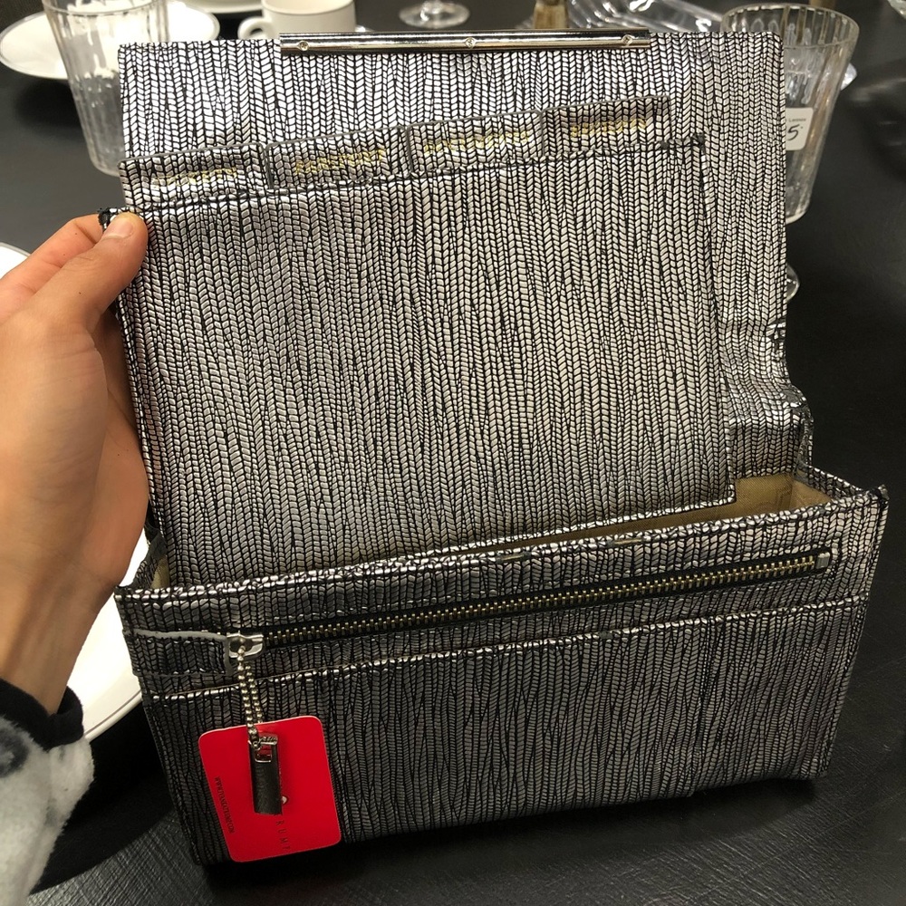 Silver Ivanka Trump Clutch Purse. ( 6in x 9 1/2 in) JB